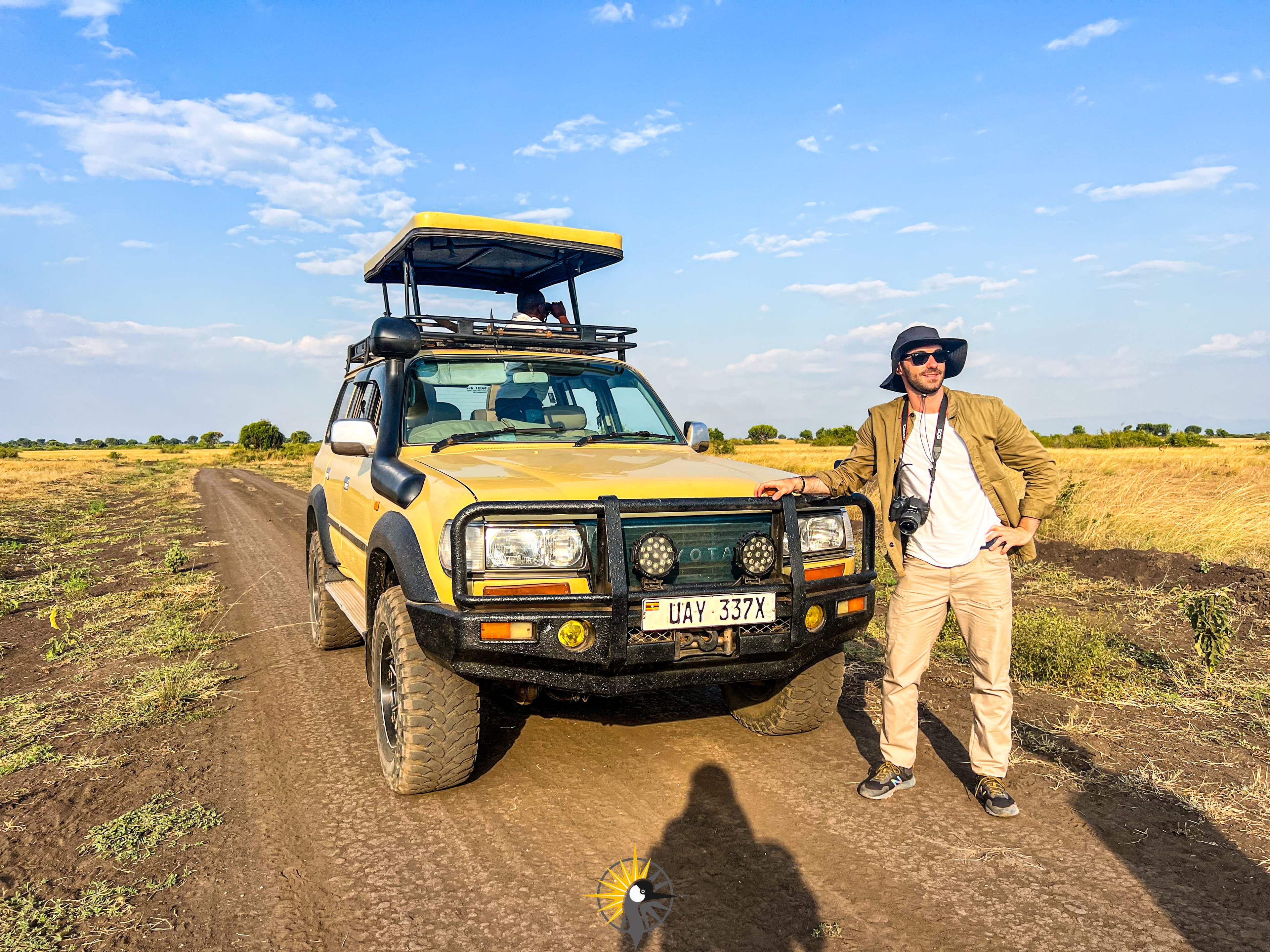a client on game drive in Queen Elizabeth National Park
